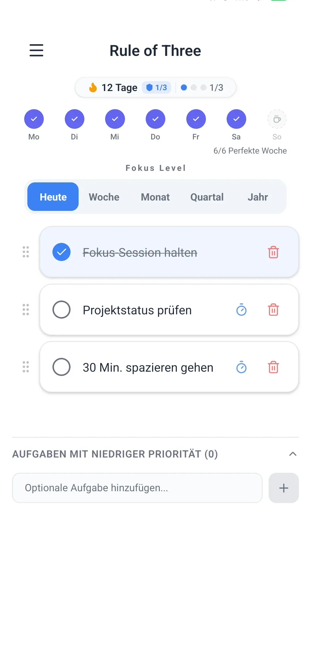 Rule of Three App-Oberfläche mit 3 Tageszielen, Fokus-Level und Fortschrittsanzeige